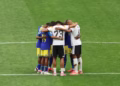 Jogadores de Alemanha e Curaçao se abraçam e rezam juntos após goleada na Copa do Mundo